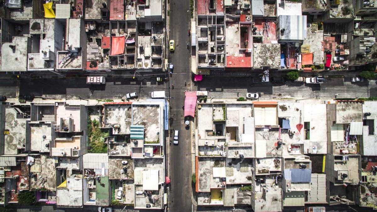 meanwhile-those-living-in-poverty-reside-in-ramshackle-dwellings-their-neighborhoods-pack-them-in-closely-like-sardines-in-a-can