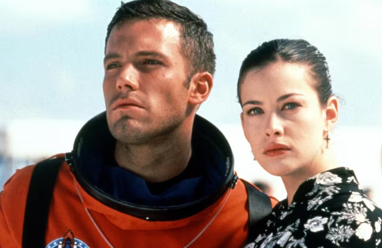 Liv Tyler interpretó a Grace Stamper, la hija de Harry Stamper y prometida de Ben A. J. Frost.